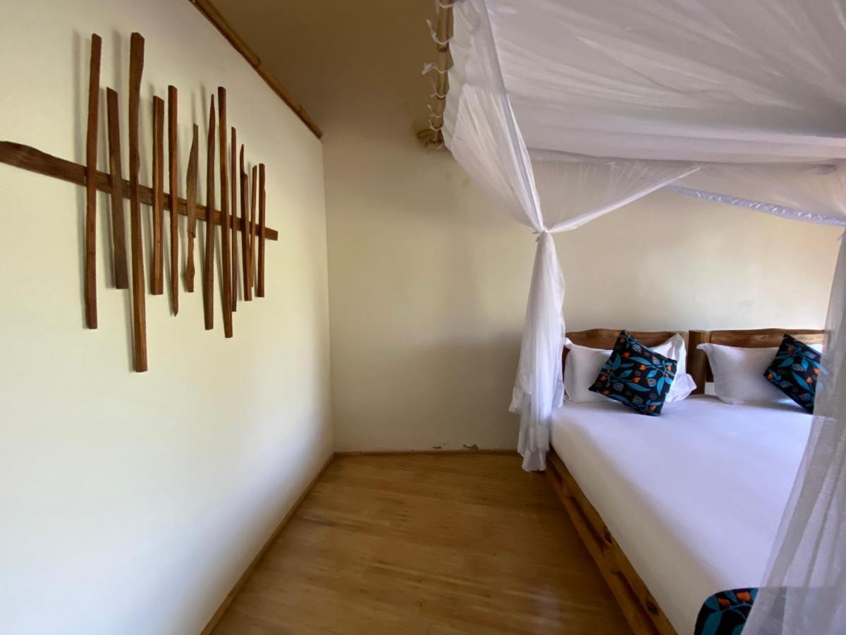 Murchison Falls Bamboo Village Paraa ภายนอก รูปภาพ